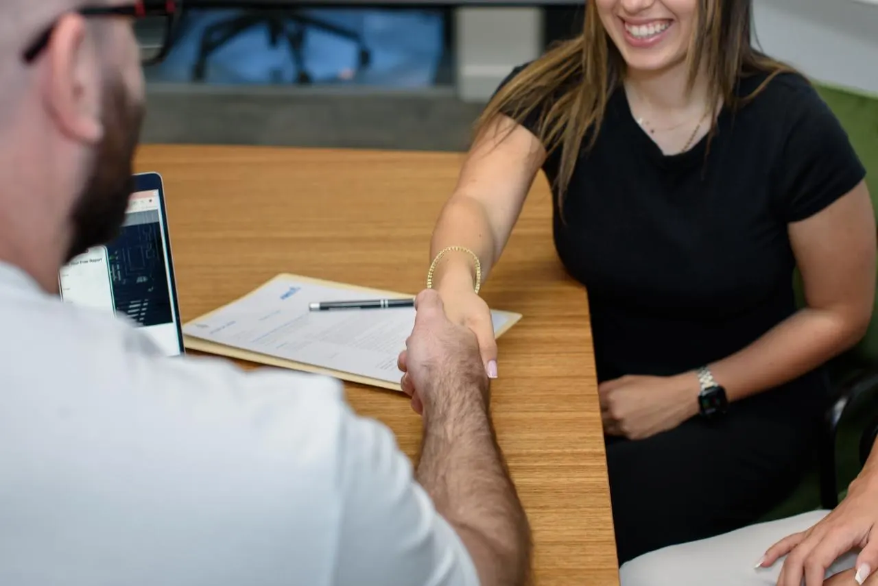 Property investor reviewing options with broker